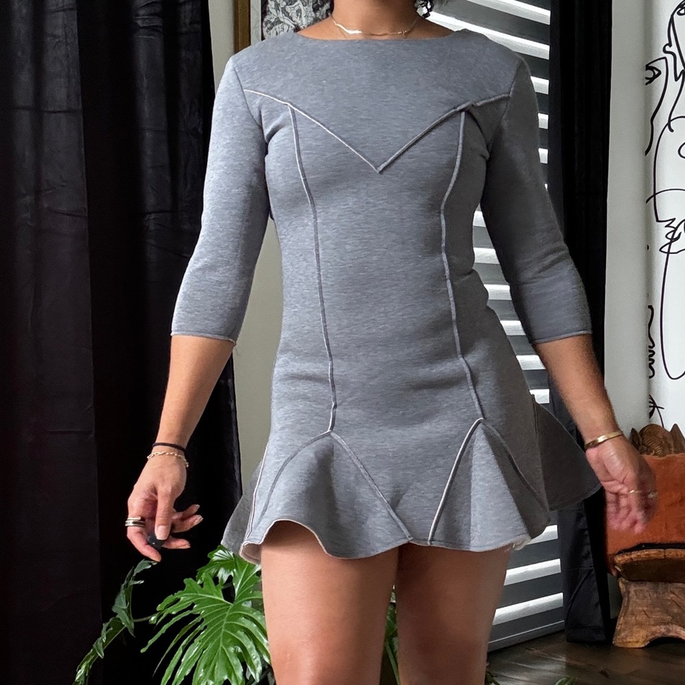 Long sleeve mini peplum dress